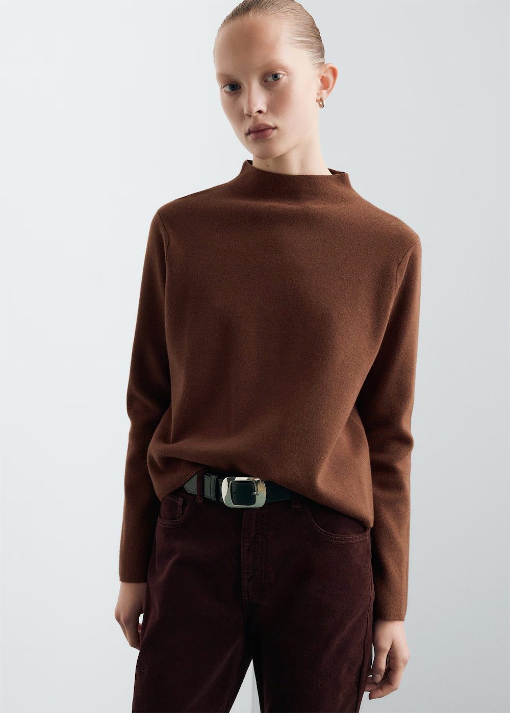 Knitted sweater with perkins neck